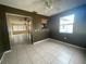 Dining area with tile floors and view of living room at 4617 49Th N Ave, St Petersburg, FL 33714
