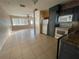 Kitchen with granite countertops and dark gray cabinets at 4617 49Th N Ave, St Petersburg, FL 33714