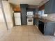 Kitchen boasts granite countertops and dark gray cabinetry at 4617 49Th N Ave, St Petersburg, FL 33714