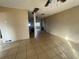Bright living room with tile floors and a view into the kitchen at 4617 49Th N Ave, St Petersburg, FL 33714