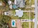 Aerial view showing house and large backyard at 605 Shore E Dr, Oldsmar, FL 34677