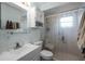 Clean bathroom with shower/tub combo and white vanity at 605 Shore E Dr, Oldsmar, FL 34677