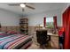 Bedroom featuring a workspace and a collection of toy cars at 605 Shore E Dr, Oldsmar, FL 34677
