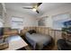Bedroom with twin bed and hobby workspace at 605 Shore E Dr, Oldsmar, FL 34677