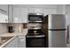 Modern kitchen with stainless steel appliances at 605 Shore E Dr, Oldsmar, FL 34677