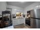 Galley kitchen with stainless steel appliances at 605 Shore E Dr, Oldsmar, FL 34677