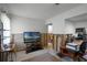 Living room with TV, open floor plan, and a view into the kitchen at 605 Shore E Dr, Oldsmar, FL 34677