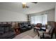 Living room with seating area and large window at 605 Shore E Dr, Oldsmar, FL 34677