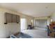 Unfinished workshop with cabinets and storage boxes at 605 Shore E Dr, Oldsmar, FL 34677