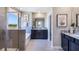 Elegant bathroom featuring a soaking tub, shower, and double vanity at 6724 Broad River Ave, Land O Lakes, FL 34638