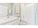 Bathroom with a bathtub, shower, and white vanity at 6732 Broad River Ave, Land O Lakes, FL 34638