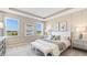 Spacious main bedroom with large windows and neutral decor at 6732 Broad River Ave, Land O Lakes, FL 34638