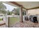Relaxing covered patio overlooking a spacious backyard at 720 Sunset Dr, Tarpon Springs, FL 34689