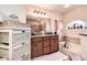 Elegant bathroom with double vanity, soaking tub, and walk-in shower at 720 Sunset Dr, Tarpon Springs, FL 34689