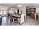 Open concept dining room with a large table and kitchen views at 720 Sunset Dr, Tarpon Springs, FL 34689