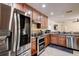 Updated kitchen featuring granite counters & stainless steel appliances at 720 Sunset Dr, Tarpon Springs, FL 34689