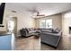 Comfortable living room with sectional sofa and tiled floors at 720 Sunset Dr, Tarpon Springs, FL 34689