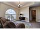Cozy sitting area with a comfortable couch and large window at 720 Sunset Dr, Tarpon Springs, FL 34689