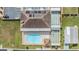 Aerial view of community pool and shuffleboard at 7800 Kay Marie Ave, Zephyrhills, FL 33541