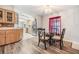 Small dining area with glass-top table and chairs at 7800 Kay Marie Ave, Zephyrhills, FL 33541