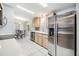 Bright kitchen with stainless steel appliances and ample counter space at 7800 Kay Marie Ave, Zephyrhills, FL 33541