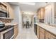 Kitchen with breakfast nook and view to backyard at 7800 Kay Marie Ave, Zephyrhills, FL 33541