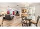 Open living and dining area with hardwood floors at 7800 Kay Marie Ave, Zephyrhills, FL 33541