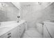 Luxurious bathroom with marble finishes and a freestanding tub at 9050 San Martin Ne Blvd, St Petersburg, FL 33702