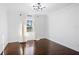 Bright bedroom with hardwood floors and large window at 9050 San Martin Ne Blvd, St Petersburg, FL 33702