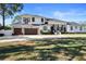 Elegant two-story home, three-car garage, and spacious yard at 9050 San Martin Ne Blvd, St Petersburg, FL 33702