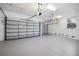 Spacious two-car garage with painted floor at 9050 San Martin Ne Blvd, St Petersburg, FL 33702