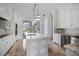 Spacious kitchen with island, stainless steel appliances, and white shaker cabinets at 9050 San Martin Ne Blvd, St Petersburg, FL 33702