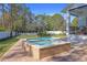 Relaxing pool and spa surrounded by a spacious patio at 9050 San Martin Ne Blvd, St Petersburg, FL 33702