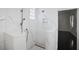 Spa-like shower with marble surround and modern fixtures at 9050 San Martin Ne Blvd, St Petersburg, FL 33702