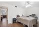 Bedroom with a double bed, nightstand, and wood-look flooring at 1000 79Th N Ave # 102, St Petersburg, FL 33702
