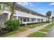 Building exterior showcasing landscaping and architectural details at 1000 79Th N Ave # 102, St Petersburg, FL 33702