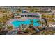 Aerial view of a community pool with surrounding amenities at 10208 Kalamazoo Pl, Parrish, FL 34219