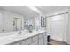 Bathroom boasts double sinks, marble countertop, and a shower at 10266 Kalamazoo Pl, Parrish, FL 34219