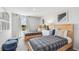 Guest bedroom with twin beds, ample natural light, and stylish decor at 10266 Kalamazoo Pl, Parrish, FL 34219