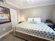 Bright bedroom with a queen-size bed and ample closet space at 106 1St E St # 115, St Petersburg, FL 33715