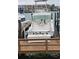 White fishing boat docked at a marina at 106 1St E St # 115, St Petersburg, FL 33715