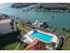 Waterfront property featuring a private boat slip and pool at 106 1St E St # 115, St Petersburg, FL 33715
