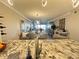 Open concept dining area with seating for six at 106 1St E St # 115, St Petersburg, FL 33715