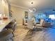 Bright dining area with seating for four at 106 1St E St # 115, St Petersburg, FL 33715
