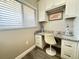 Built-in home office with granite countertop and ample storage at 106 1St E St # 115, St Petersburg, FL 33715