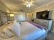 Spacious main bedroom with king bed and dresser at 106 1St E St # 115, St Petersburg, FL 33715
