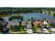 Aerial view of lakefront home in a quiet community at 11507 Whispering Hollow Dr, Tampa, FL 33635