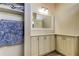 Bathroom with vanity, storage, and a linen closet at 11507 Whispering Hollow Dr, Tampa, FL 33635