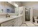Bathroom boasts double vanity and a large shower at 11507 Whispering Hollow Dr, Tampa, FL 33635