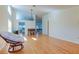 Bright dining area with hardwood floors and view to kitchen at 11507 Whispering Hollow Dr, Tampa, FL 33635